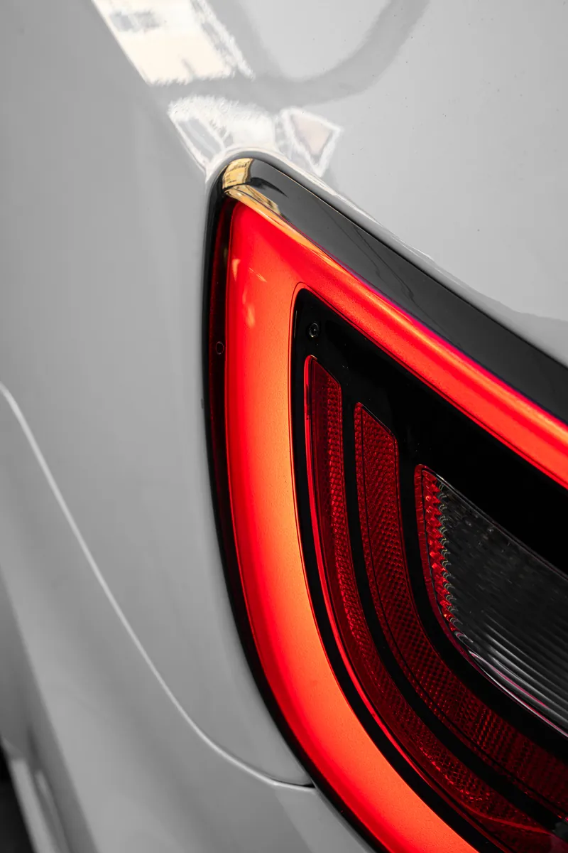 Red LED taillight on a white Dodge Durango SRT